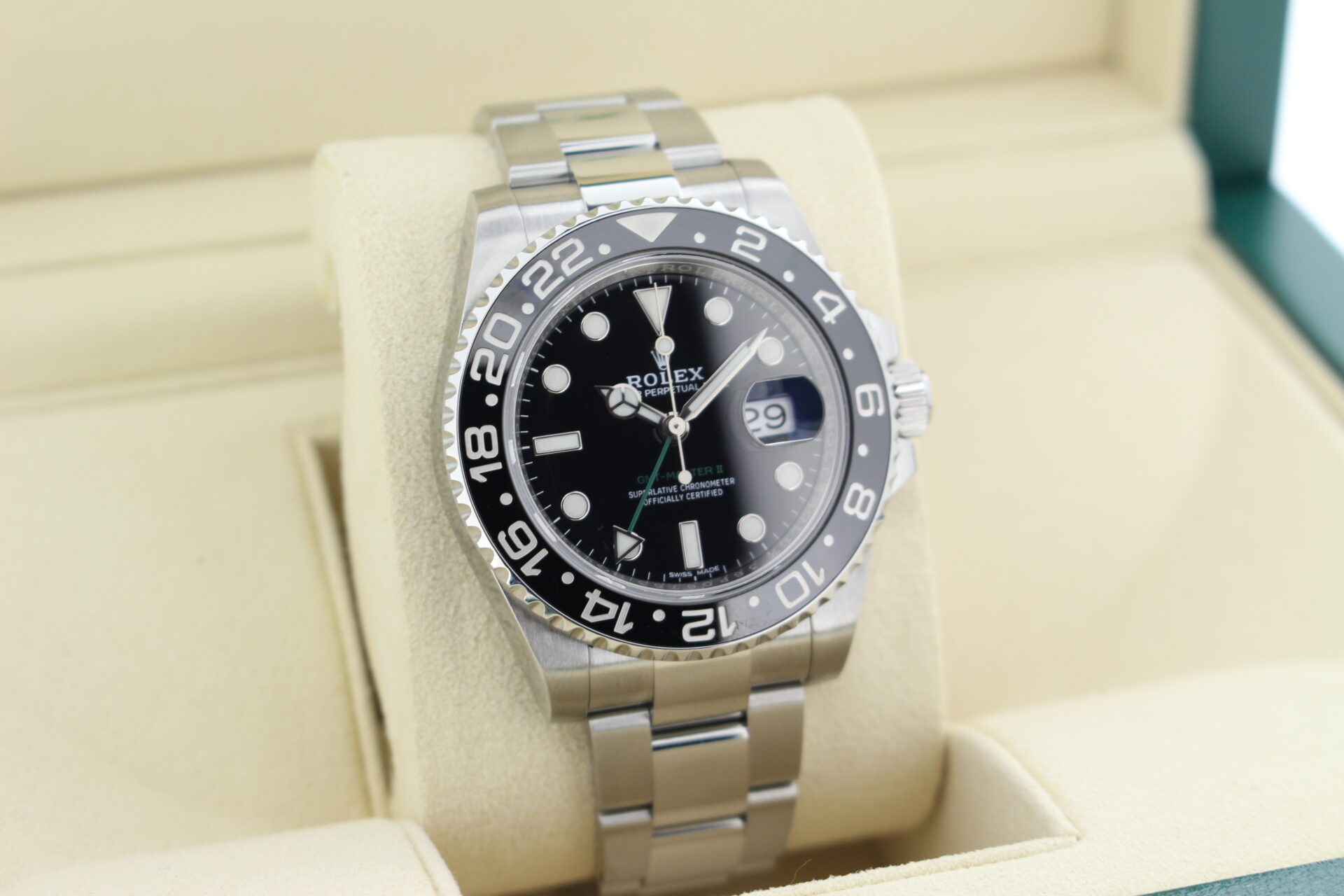 Rolex GMT Master II 116710LN facing towards the right to show the left angle