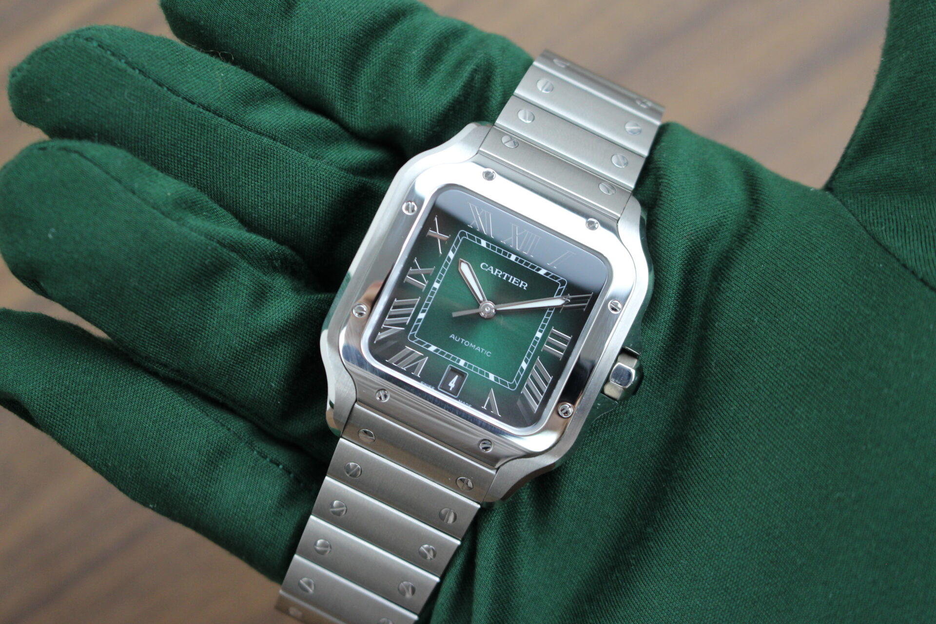 Cartier De Santos Green Large on a hand