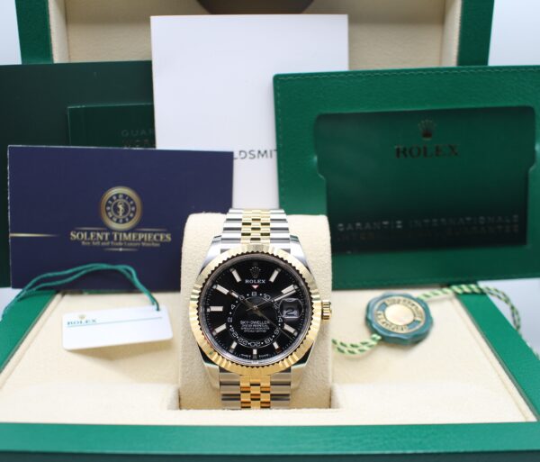 Rolex Sky-Dweller Black Stainless steel and yellow gold in its box with all original accessories making a full set