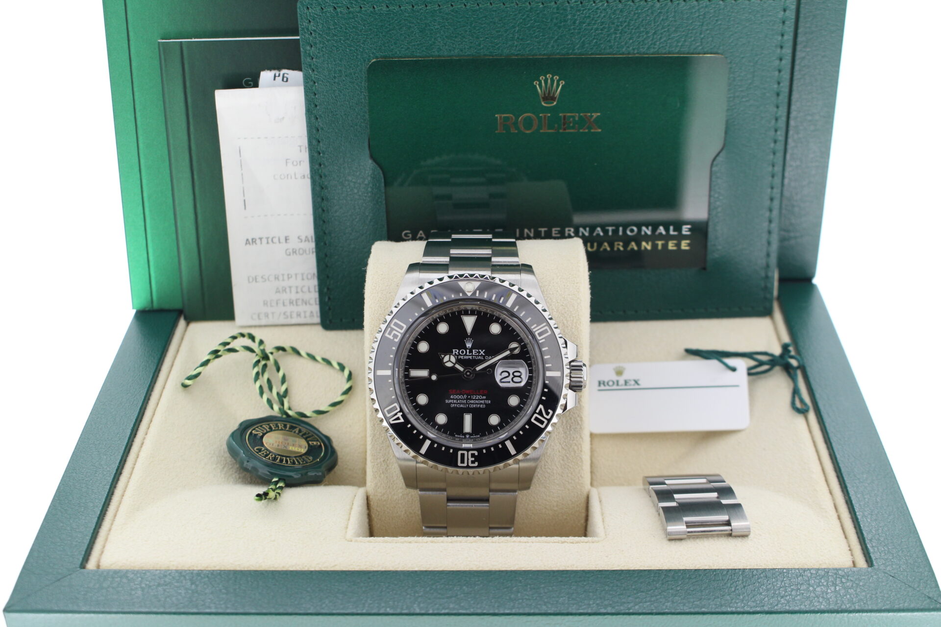 Rolex Sea-Dweller 50th Anniversary 126600 in it's box with both swing tags, booklets, original purchase receipt and warranty card