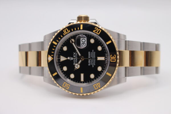 Rolex Submariner bi-metal on a white background