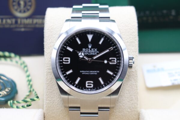 Rolex Explorer 40mm black dial watch reading 10 past 10