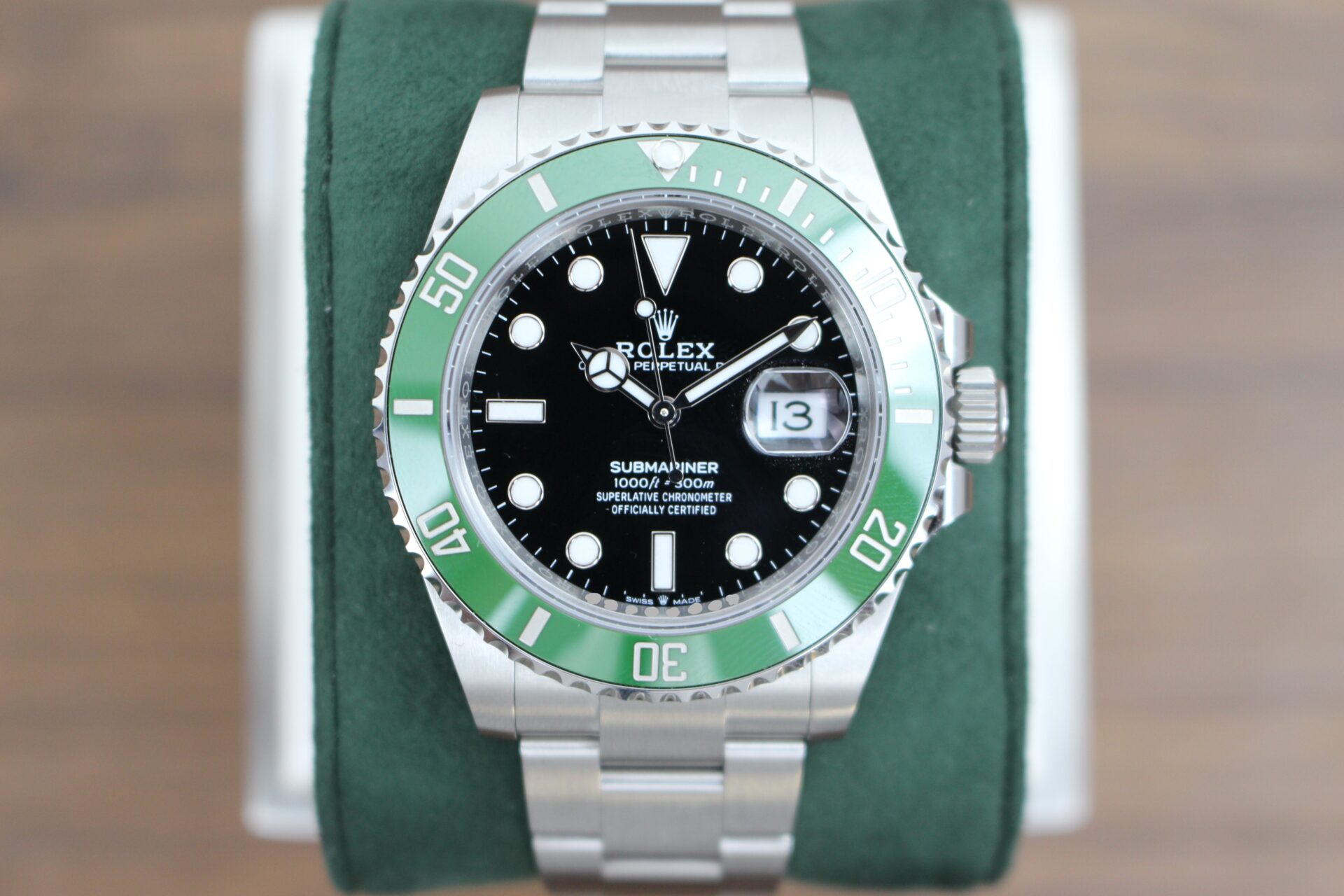 Rolex Submariner Starbucks 41mm 126610LV on a green cushion