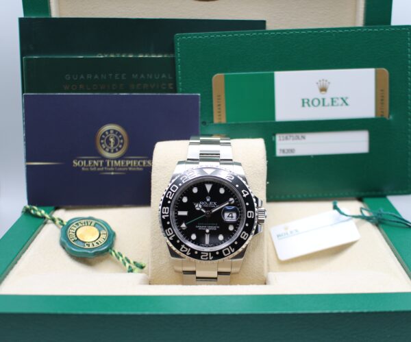 Rolex GMT Master II in its box with all original accessories making a full set