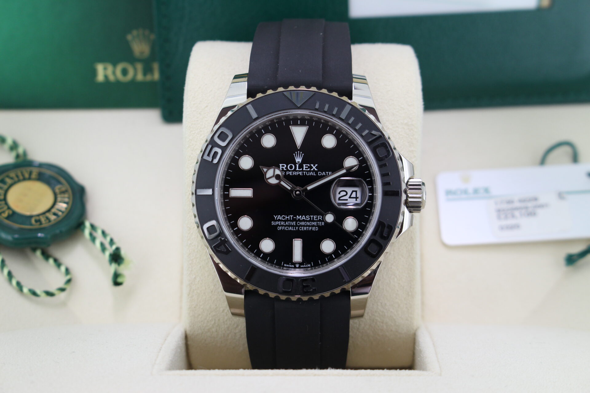Close up of Rolex Yacht-Master 42 226659 in it's box with both swing tags, booklets and warranty card