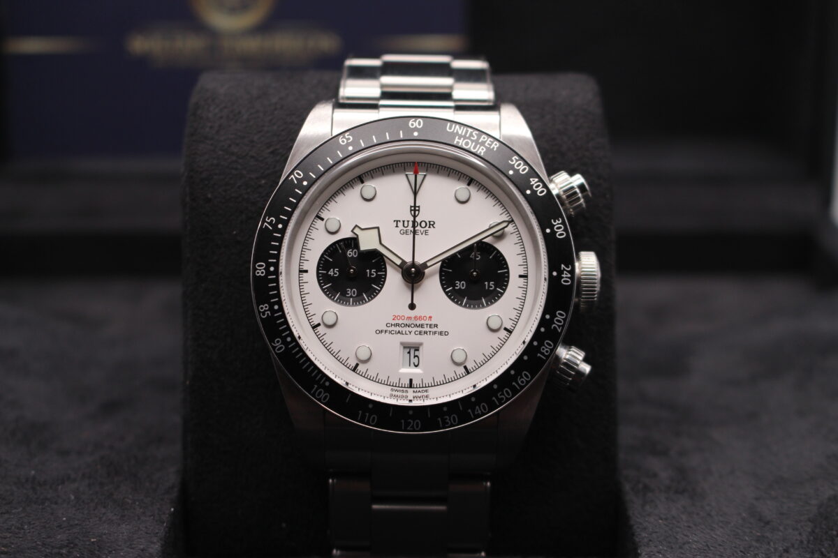 Tudor Black Bay Chrono reading 10 past 10 sat on a black cushion