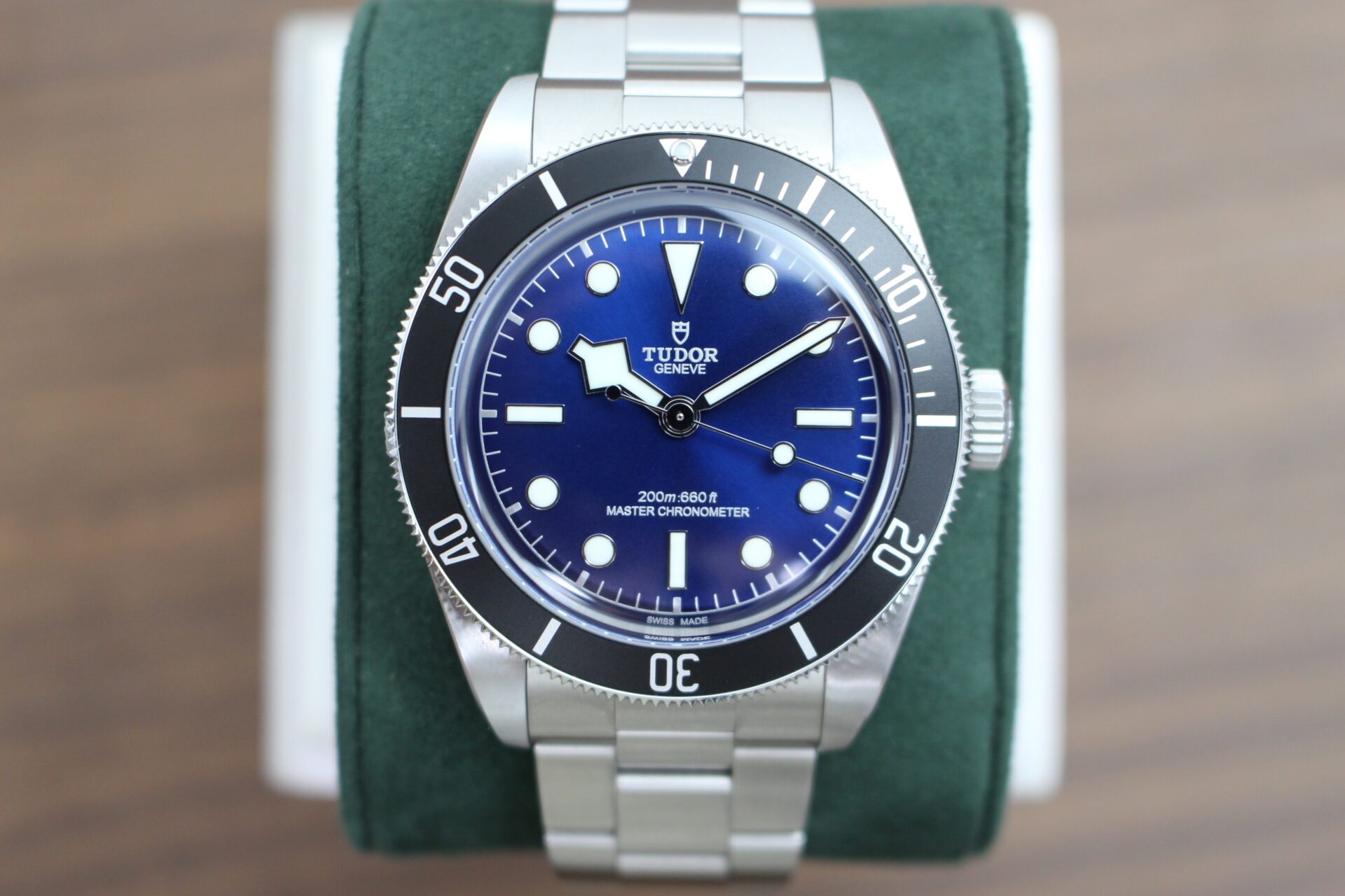 Tudor Black Bay 68 7943A1A0NU on a green cushion