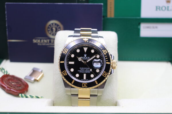 Close up of Rolex Submariner Bi-metal in its box