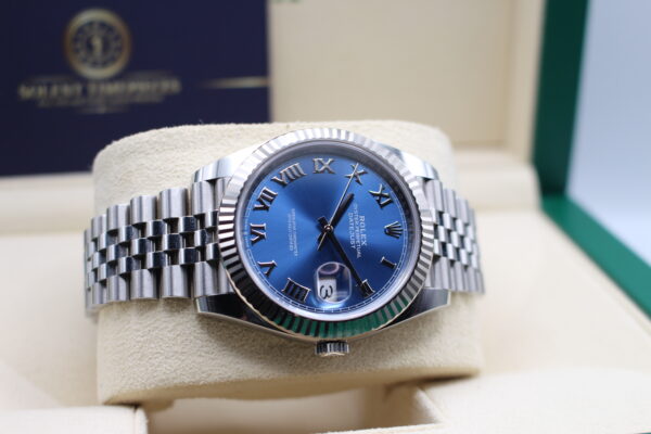 Rolex Datejust 41 on Jubilee laid on its side with a Azzurro blue dial