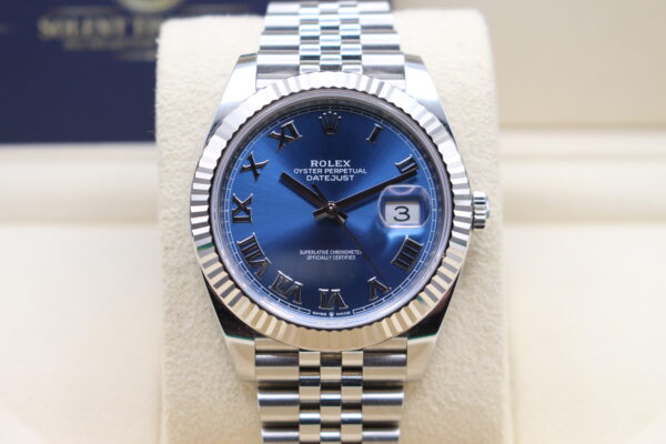 Close up view of the datejust with its bright blue Azzurro dial and white gold bezel
