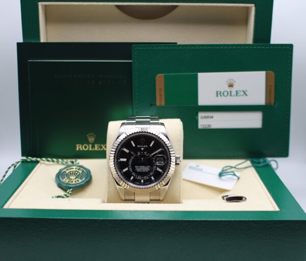 Rolex Sky-Dweller 326934 in its box with both swing tags, spare link, booklets and warranty card