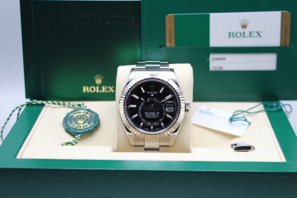 Rolex Sky-Dweller 326934 in its box with both swing tags, spare link, booklets and warranty card