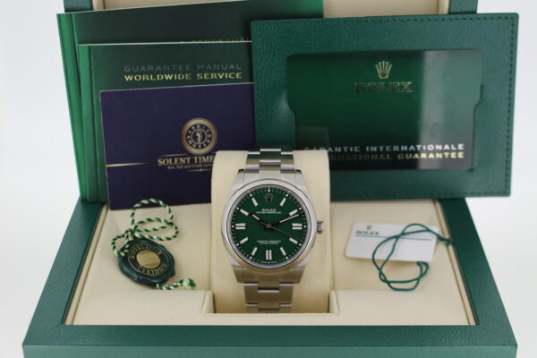 Rolex Oyster Perpetual 41mm Green with all its original accessories making a full set