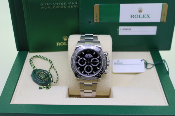 Rolex 116500LN Daytona Black in its box with swing tags and booklets