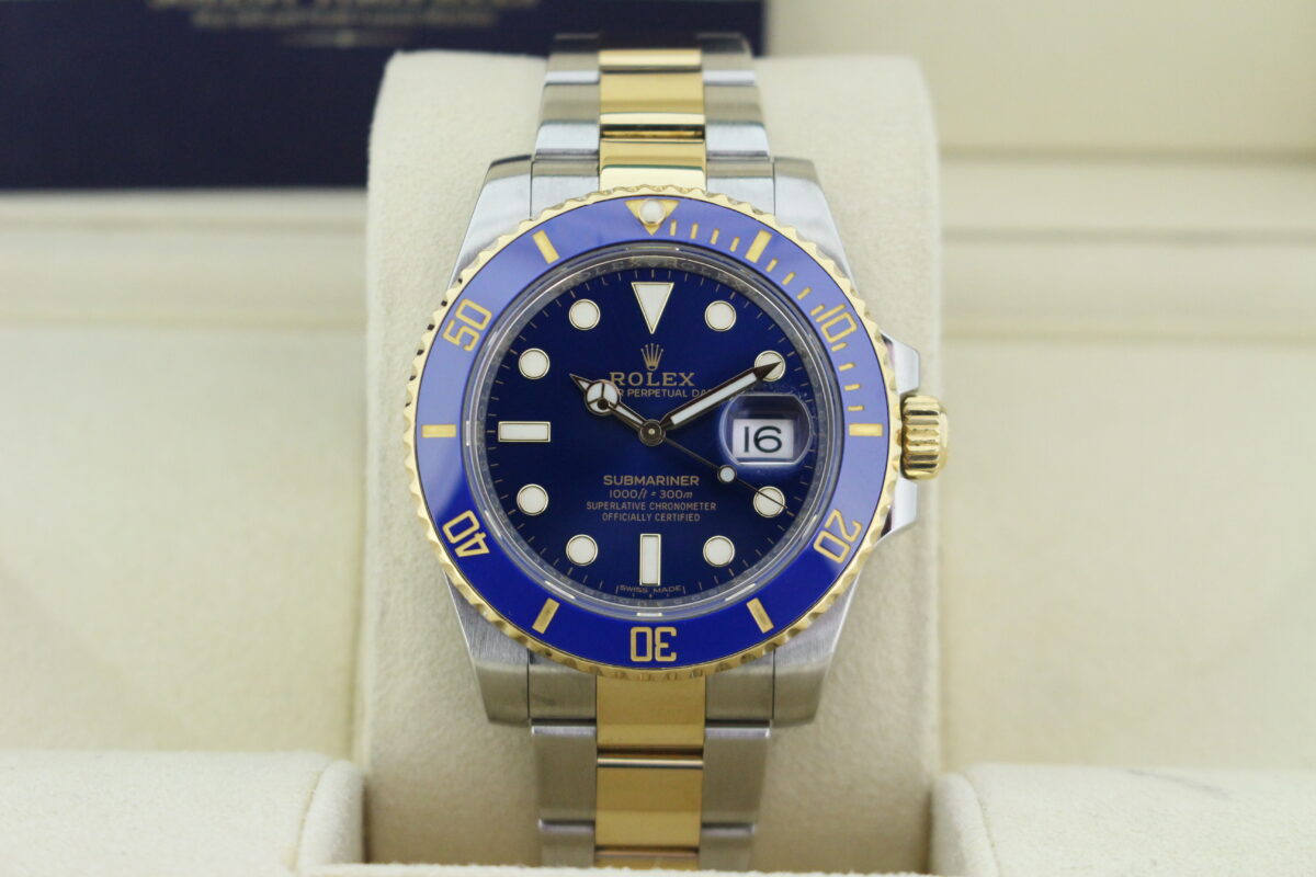 Rolex Submariner Bluesy bi metal watch sat upright in its cushion