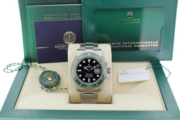 Rolex submariner date in its box with all original accessories making a full set