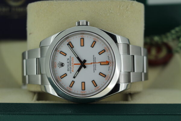 Rolex Milgauss white dial laid on its side with the crown facing up