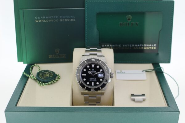 Rolex Submariner Date 2025 in its box with all original accessories making a full set