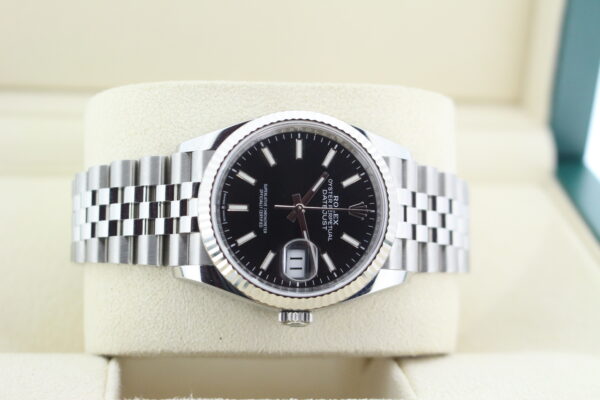 Rolex DJ black batton dial laid down in its box