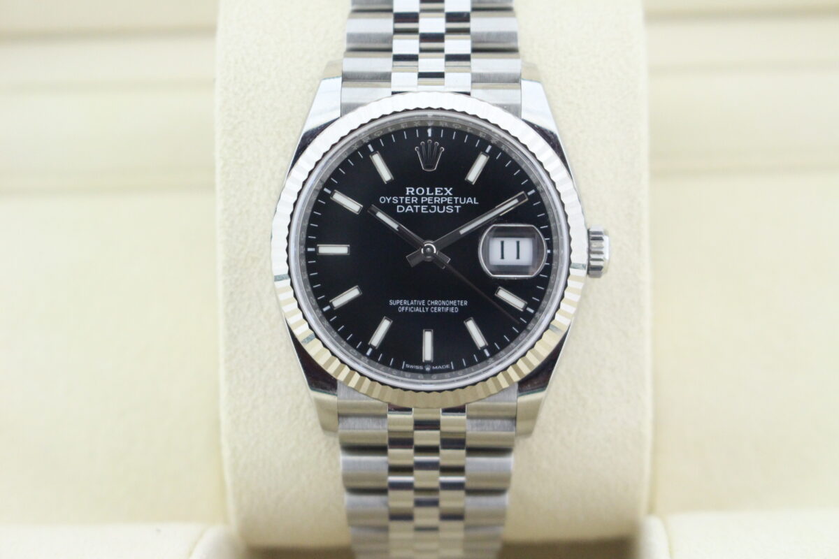 Rolex Datejust 36mm Black Dial with a fluted bezel on a jubilee bracelet