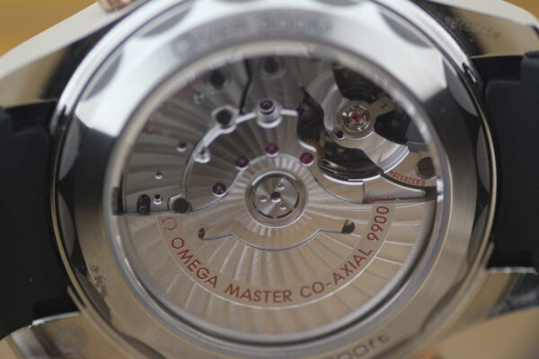 Omega Seamaster Sedna, sapphire case back close up to show inner workings
