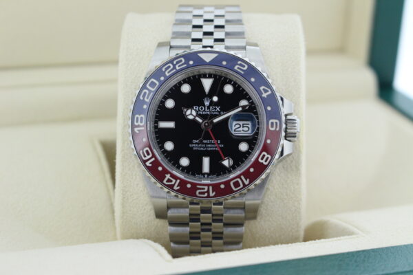Rolex GMT Master II with a red and blue bezel