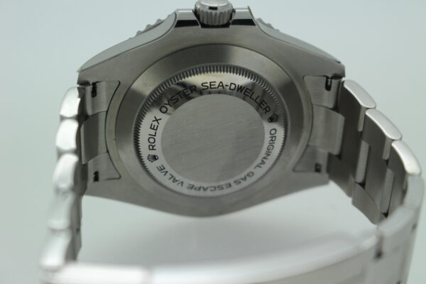 Rolex Sea-Dweller case back with text