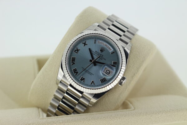 Rolex platinum day date with a cool ice blue dial
