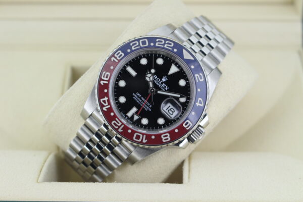 Rolex GMT Master II Pepsi at an angle with a red and blue bezel