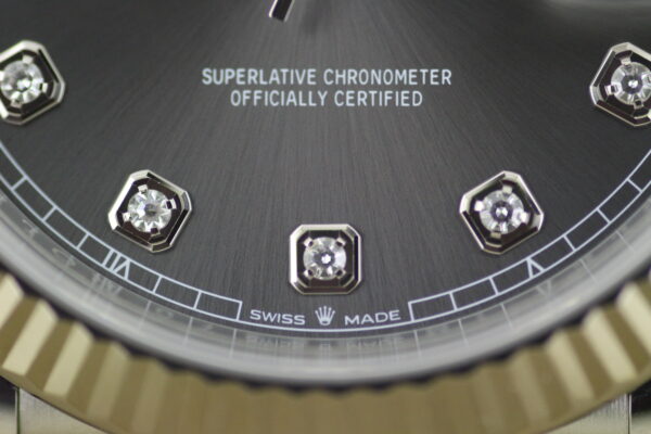 Close up of the slate dial showing of the diamond numerals