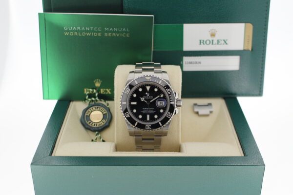 Rolex Submariner in its box with all original accessories making a full set