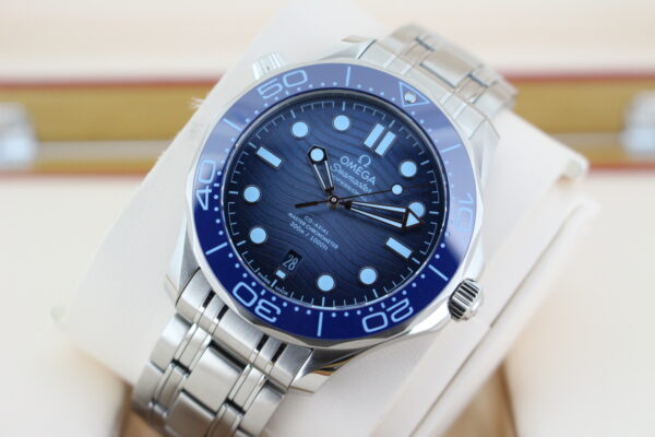 Omega seamaster 300m showing off the beautiful summer blue dial