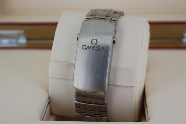 Omega clasp with micro adjustment