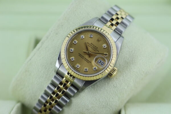 Gold dial diamond datejust with a fluted bezel on a jubilee bracelet