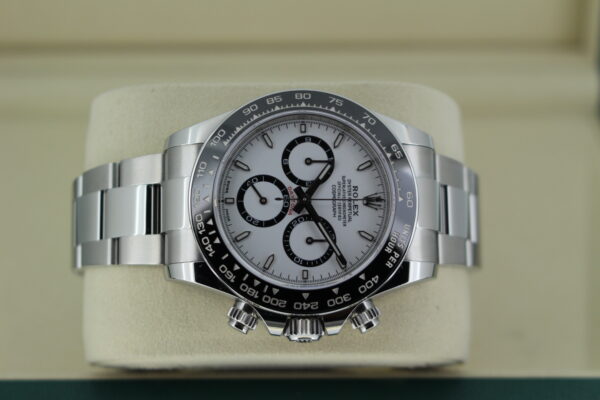 Rolex Daytona 'Panda' 126500 in it's box turned to on its side with the crown pointing down into the box.