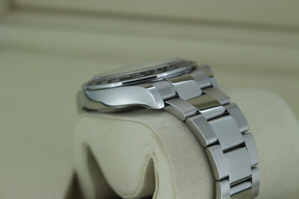 Rolex Daytona 'Panda' 126500 in it's box turned to show the watch case with no signs of wear