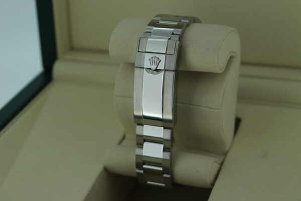 Rolex Daytona 'Panda' 126500 inside a Rolex box showing the clasp which features the Rolex logo.