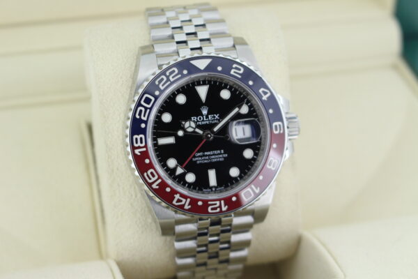 Rolex GMT Master II Pepsi 126710BLRO facing towards the right to show the left angle