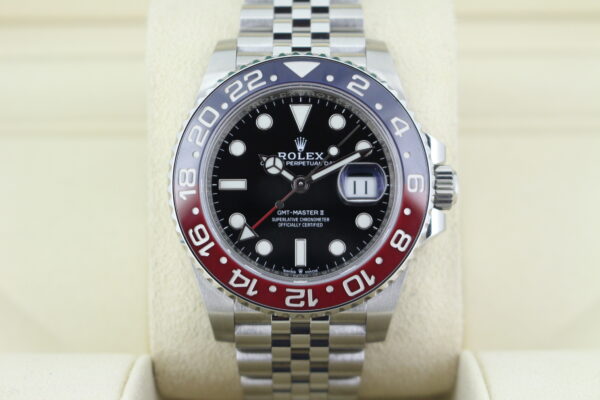 Rolex GMT Master II Pepsi 126710BLRO facing forward, red and blue bezel and black dial