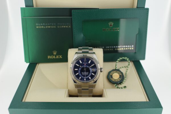 Rolex Sky-Dweller 336934 in it's box with booklets, green swing tag and warranty card