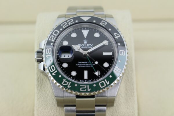 Rolex Sprite with light reflecting on its dial