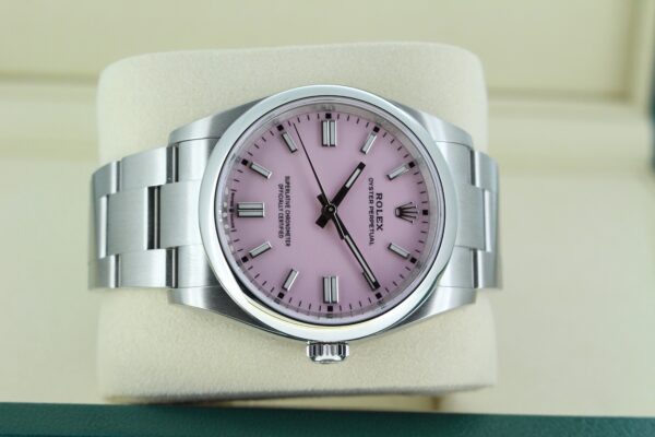Rolex Oyster Perpetual 36 126000 with pink dial on it's side