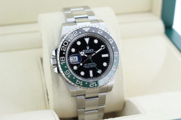Rolex GMT Master II Sprite 126720VTNR facing towards the right to show the left angle