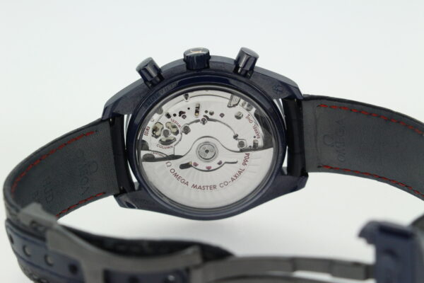Sapphire caseback showcasing the omega movement