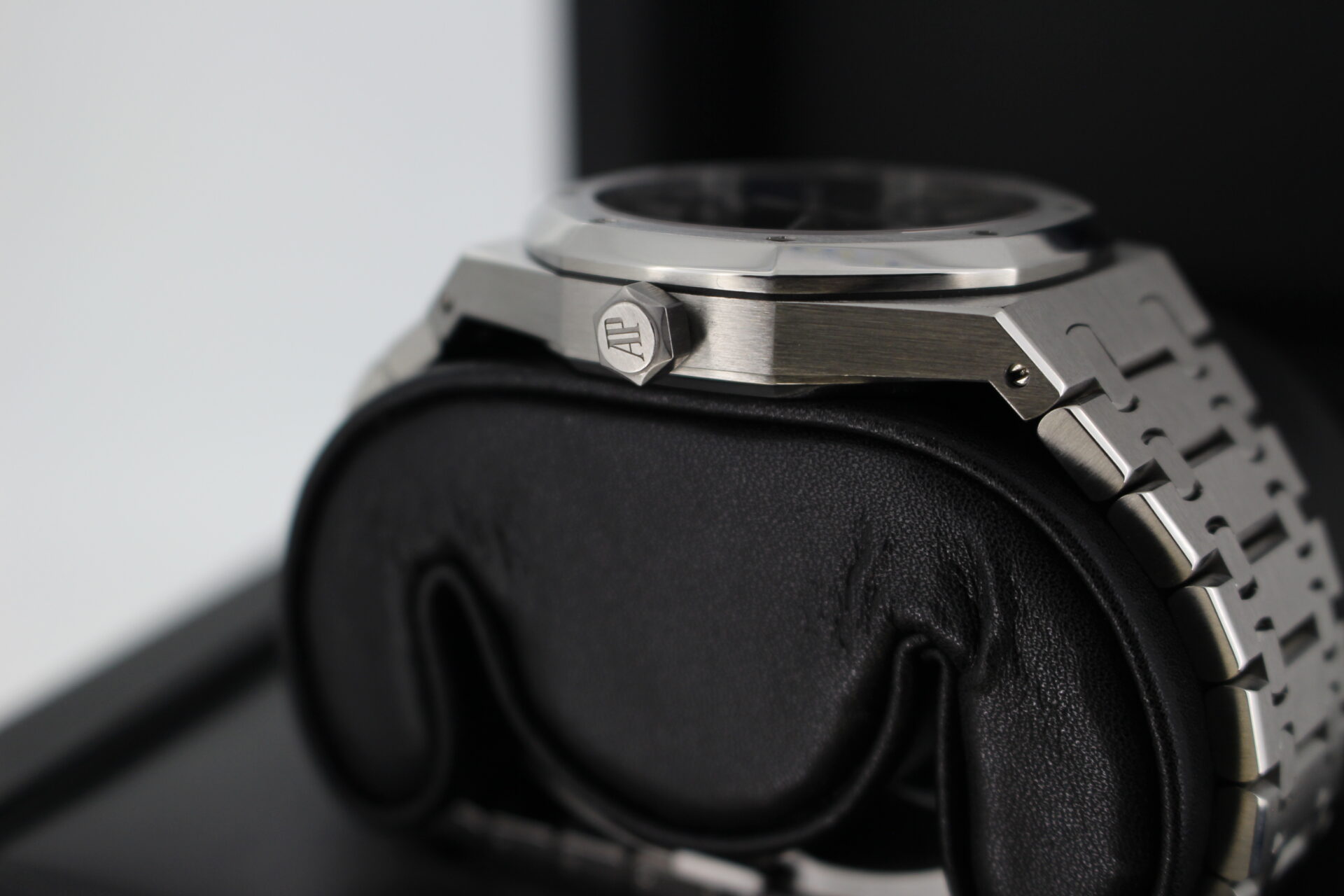 Side view of watch case and crown