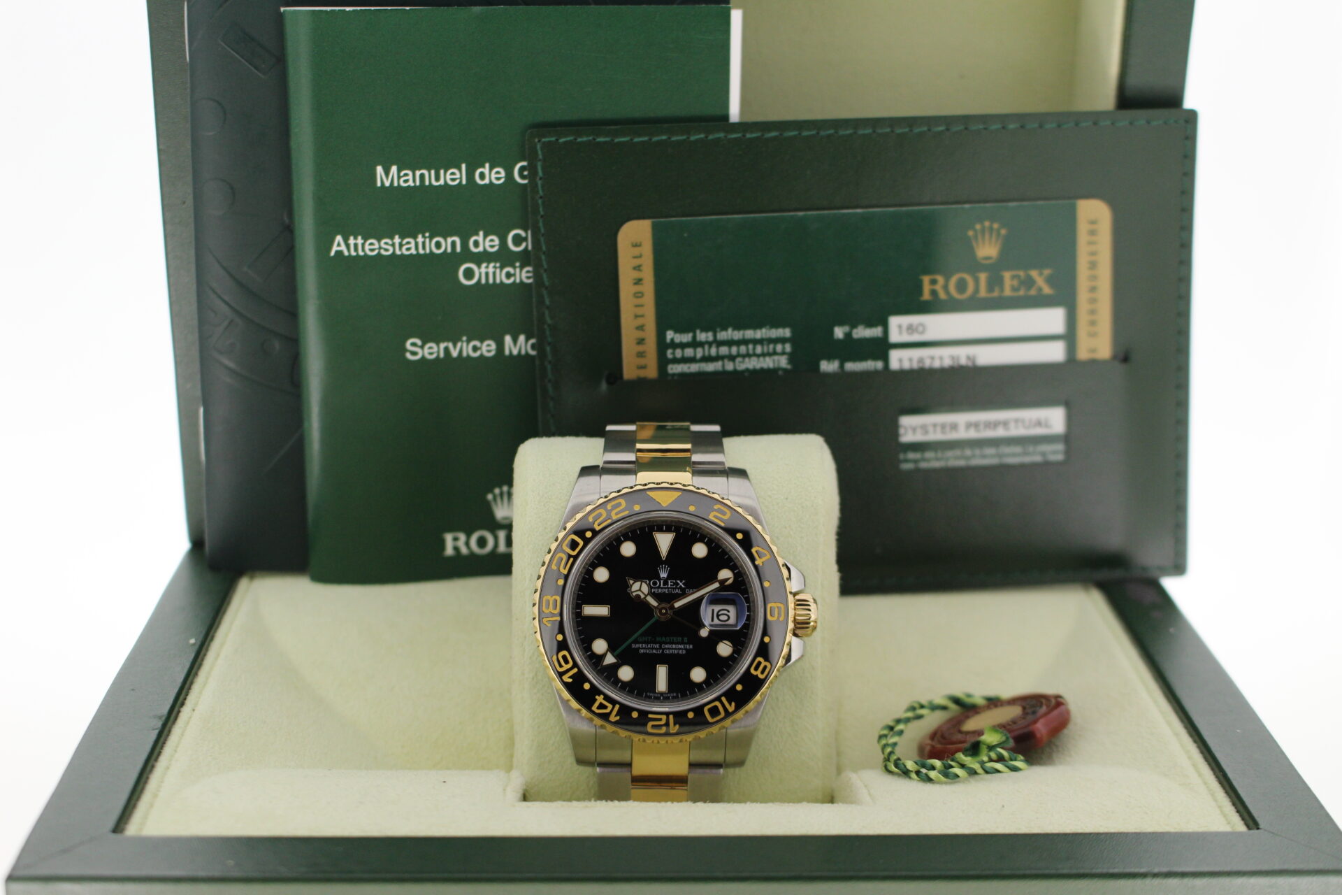 Rolex GMT Master II 116713LN in its box with all original accessories making a full set