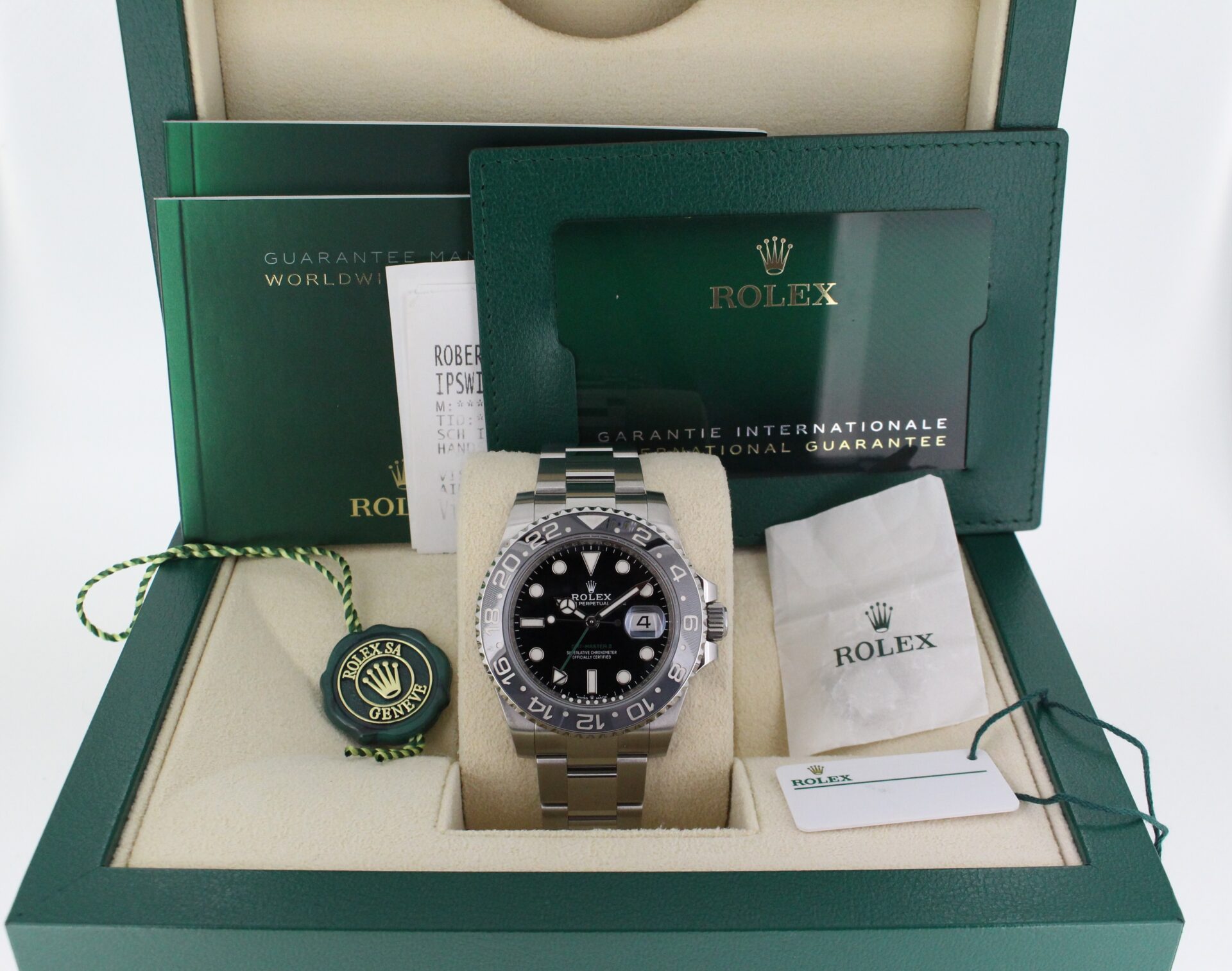 Rolex GMT Master II Bruce Wayne 126710GRNR in it's box with booklets, both swings and warranty card
