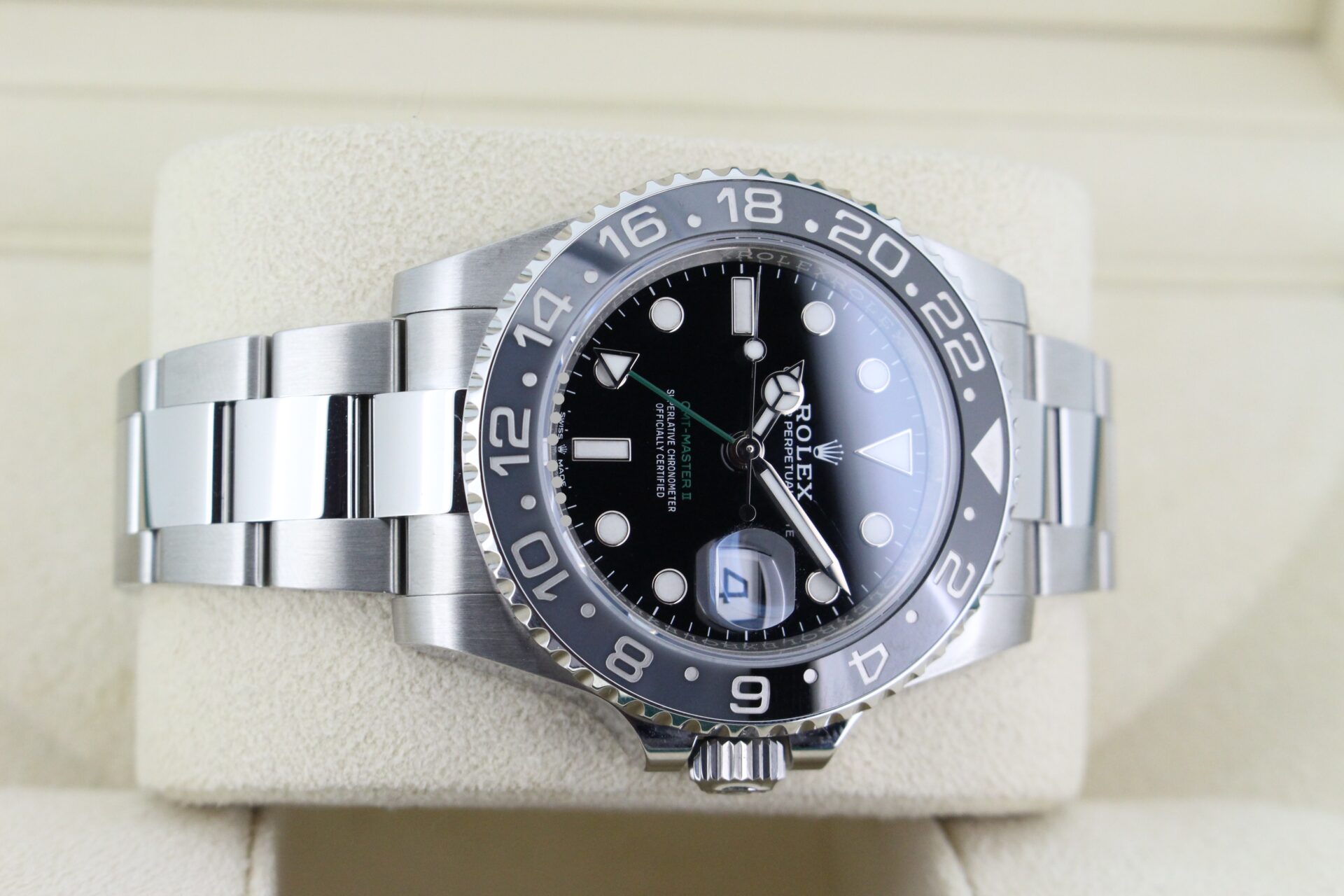 Rolex GMT Master II Bruce Wayne 126710GRNR on it's side
