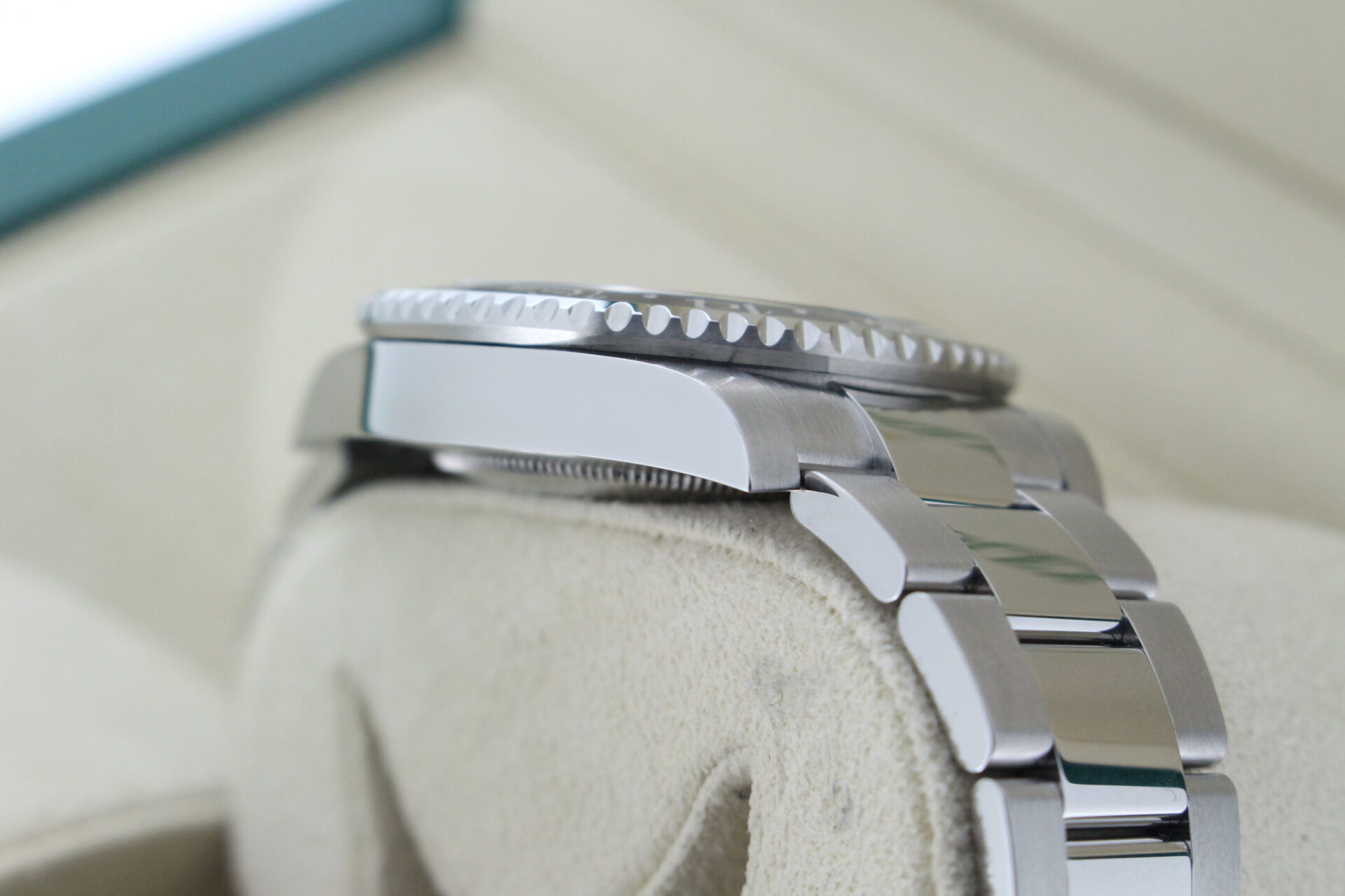 Rolex GMT Master II Bruce Wayne 126710GRNR angled view of case