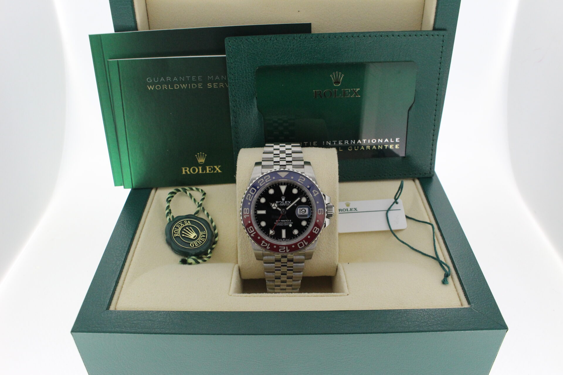 Rolex GMT Master II Pepsi 126710BLNR in it's box with both swing tags, booklets and warranty card